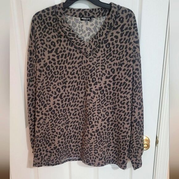 HEIMISH USA Tops - Heimish Boutique Brand Leopard Print V-Neck Top Size L